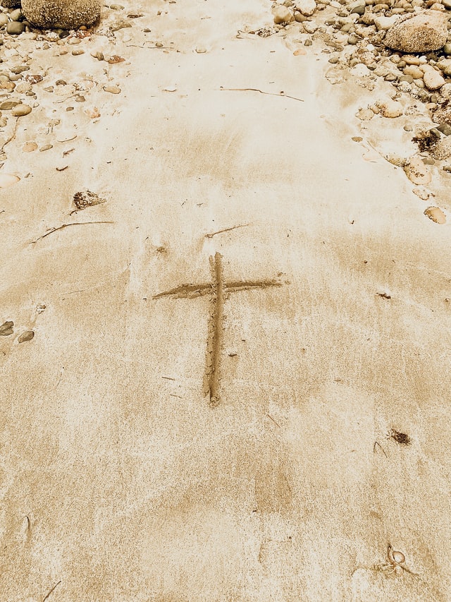 Cross in the sand